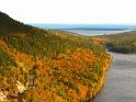 Fall foliage, view of Park Loop Road, Jordan Pond and offshore islands from the South Bubble, Acadia National Park, Maine